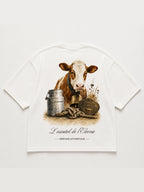 T-shirt blanc L'Éleveur – illustration vache, cloche, bidon de lait et plaque Concours Agricole, collection Les Essentiels Héritage Authentique